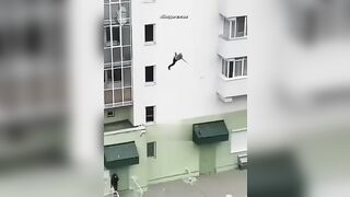 A Suicidal Man Climbed Out Of A Tenth-floor Window. Novosibirsk