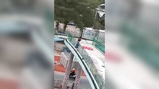 A Woman Jumps Off A Bridge And Lands On A Patsy Roof