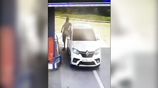 Absolute Idiot Using A Lighter At A Gas Station...