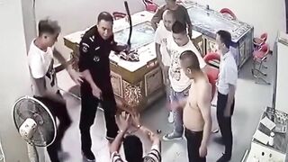 Chinese Police Brutally Beat Neighbors