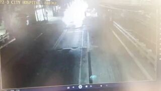 A Biker Who Fell From His Motorbike As He Traveled Over A Bus.
