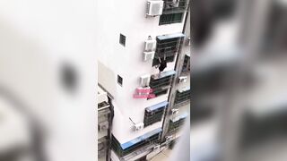 Girl Falls While Trying To Climb Out Of Apartment