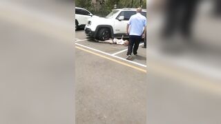 Man Repeatedly Crushes Wife While Others Try To Help Him