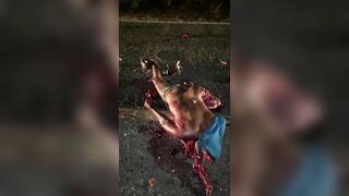 Motorcyclist's Body After Being Hit By Truck 