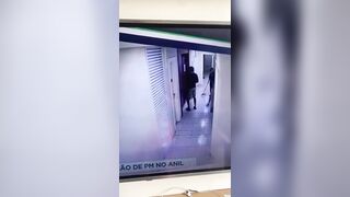 Rio De Janeiro Police Officer Chased With Rifle