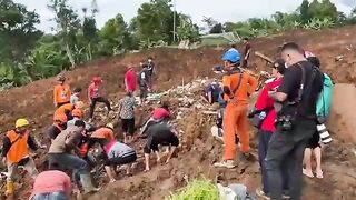 Rescue Workers Continue To Search For Earthquake Survivors