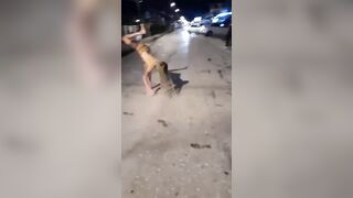 This Idiot Girl Tried To Do A Handstand On Her Hands In The Street, But W