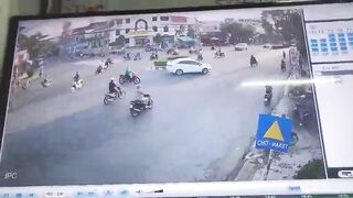 Truck Turns Motorcyclist Into Invisible Object 