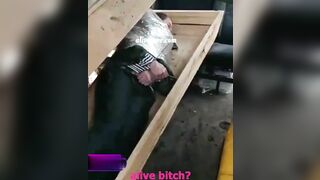 Ukrainian Nazis Put A Russian Supporter In A Coffin