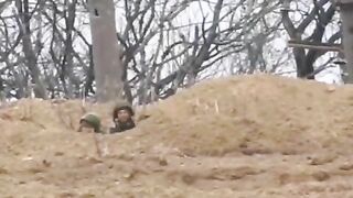 Russian Sniper Kills Ukrainian With Precise Headshot