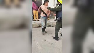 Angry Man Stabs Rival In Front Of Police