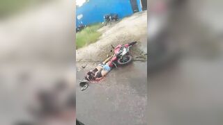 Couple Riding Motorcycle Loses Control And Crashes, Truck Overturns