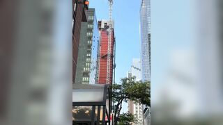 Crane Catches Fire And Partially Collapses On 10th Avenue