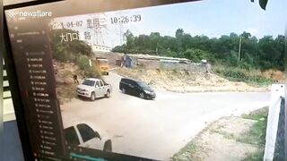 Chinese Pedestrian Nearly Buried By Truck