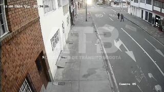 Car Ignores Stop Sign, Hits Bus In Colombia