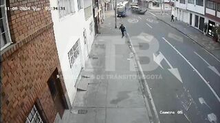 Car Ignores Stop Sign, Hits Bus In Colombia