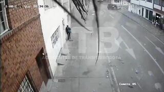 Car Ignores Stop Sign, Hits Bus In Colombia