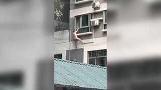 Naked Spiderman Falls From A Building