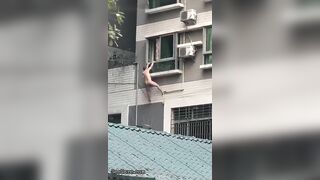 Naked Spiderman Falls From A Building