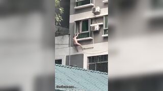 Naked Spiderman Falls From A Building