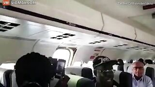 Emergency Door Falls Off During Landing, Causing Panic