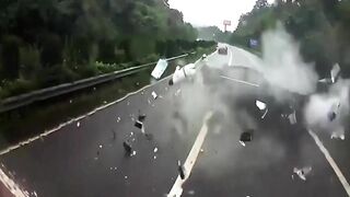Passenger Thrown From Rear Window Of Car Onto Road