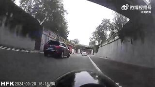 Beijing Photographer Pushed Into Wall By SUV