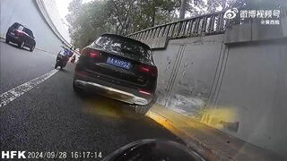 Beijing Photographer Pushed Into Wall By SUV