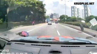 Spinning Tire Hits Motorcycle