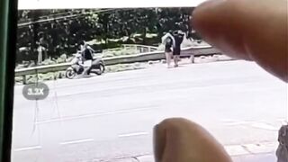 Young Couple crossing the Street together with Man in Front