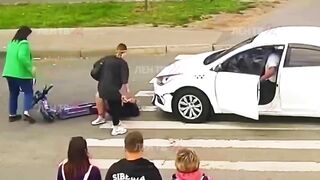 Young Scooter Girl has not yet Learned Traffic Rules