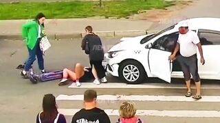 Young Scooter Girl has not yet Learned Traffic Rules