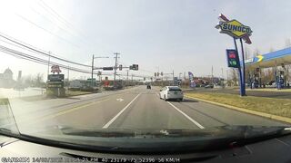 idiot decides to merge back from right only lane