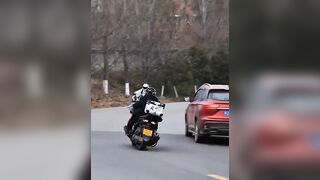 out of lane rider causes other rider to crash
