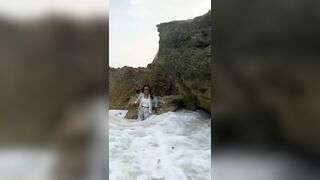 posing in a cove with a tidal wave rWhatcouldgowrong