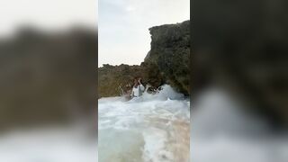 posing in a cove with a tidal wave rWhatcouldgowrong