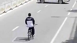 riding a bike with your hand in your pockets rWhatcouldgowr