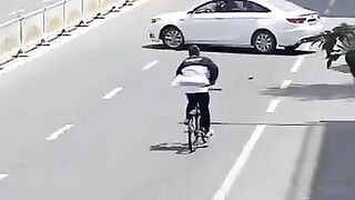 riding a bike with your hand in your pockets rWhatcouldgowr