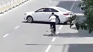 riding a bike with your hand in your pockets rWhatcouldgowr