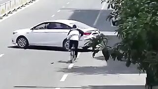 riding a bike with your hand in your pockets rWhatcouldgowr