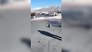 speeding with your car to try jumping over a pile of snow rWhatc