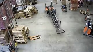 worker somehow manages to avoid being pancaked by his forklift