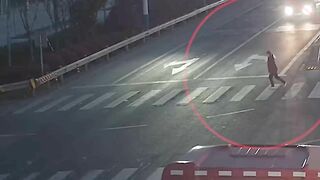 Woman Trying To Cross The Road