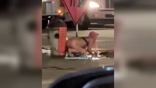 A Naked Woman Uses A Fire Hydrant In San Francisco