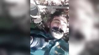 A Captured Enemy Soldier Was Stabbed In The Throat With Kn(1).