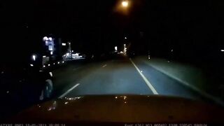 A Car Traveling At 50mph Hits A Man On A Road At Night 