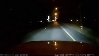 A Car Traveling At 50mph Hits A Man On A Road At Night 