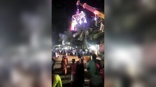 A Crane Collapses Above Crowds During Festival 