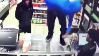 A Police Officer Enters A Store During A Robbery 