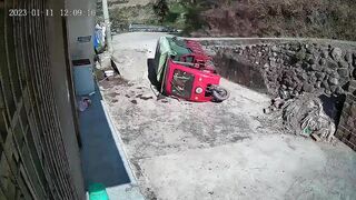 A Tuk-tuk Overturns And The Driver Falls Out Of The Taxi 